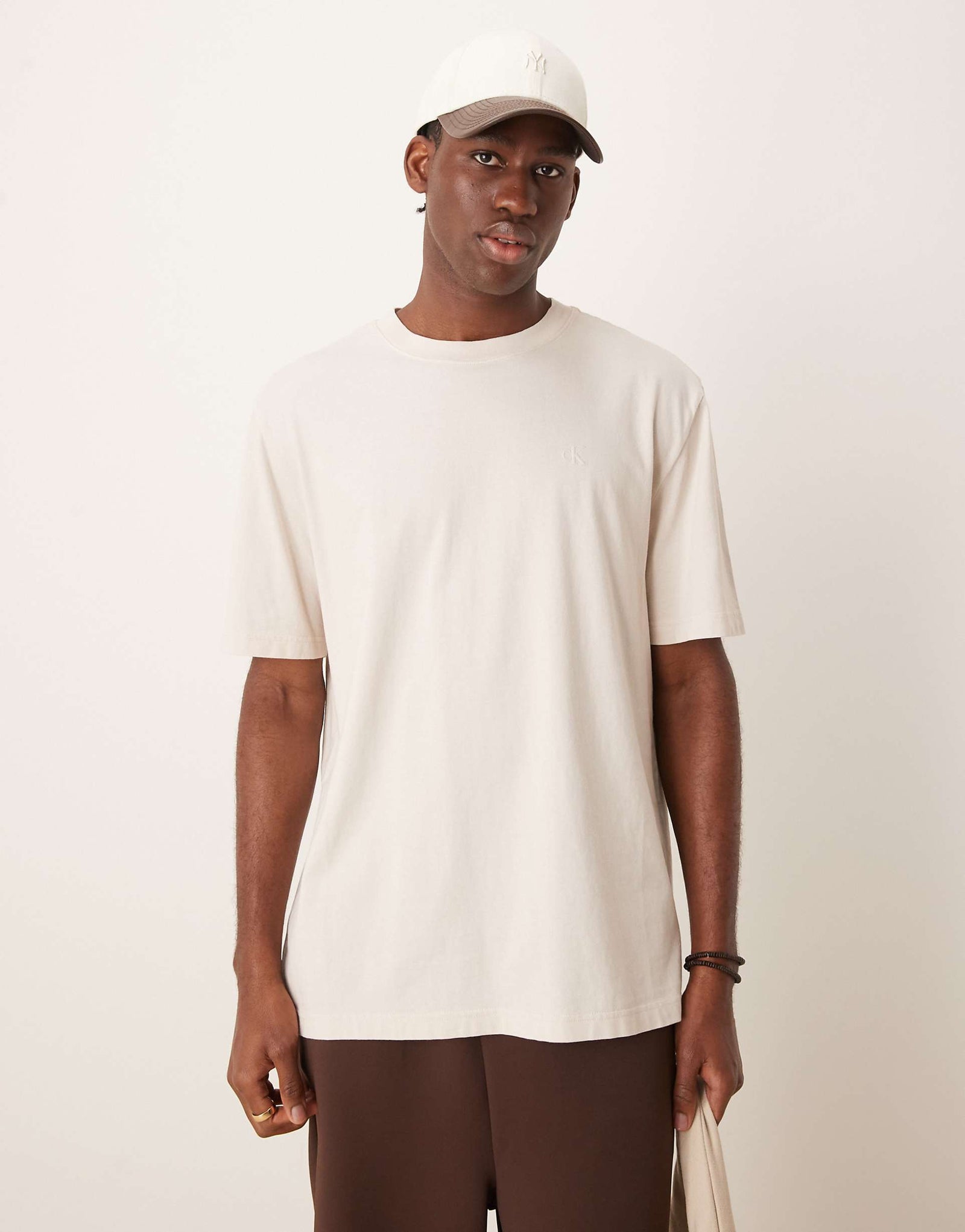 Calvin Klein Jeans logo back print t-shirt in washed oatmeal.
