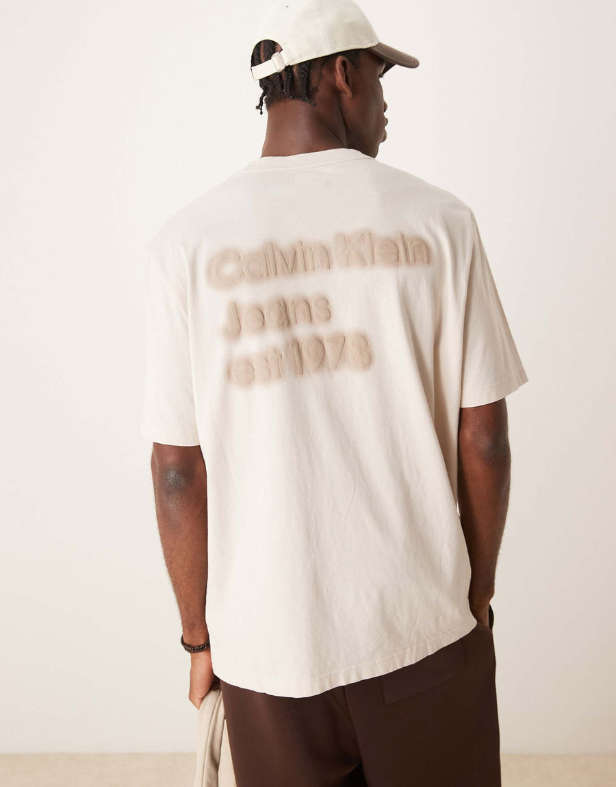 Calvin Klein Jeans logo back print t-shirt in washed oatmeal.